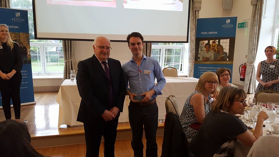 Congratulations to Thomas Somers for winning the student presentation competition. Here he is accepting his prize from Professor Colin Baker.